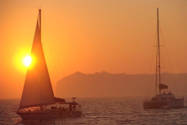 sunset sailing santorini greek islands