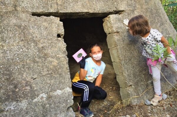 kids exploring pyramids greece